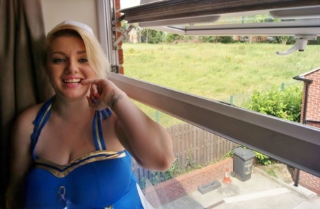 Big chubby JessicasHoneyz bends for naked upskirt & offers up huge big tits