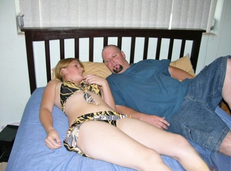 Strawberry blonde amateur with a shaved pussy sucks of a bald dude