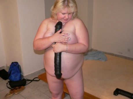 Lusty mature BBW Sheila sucking and fucking huge sex toys in a solo
